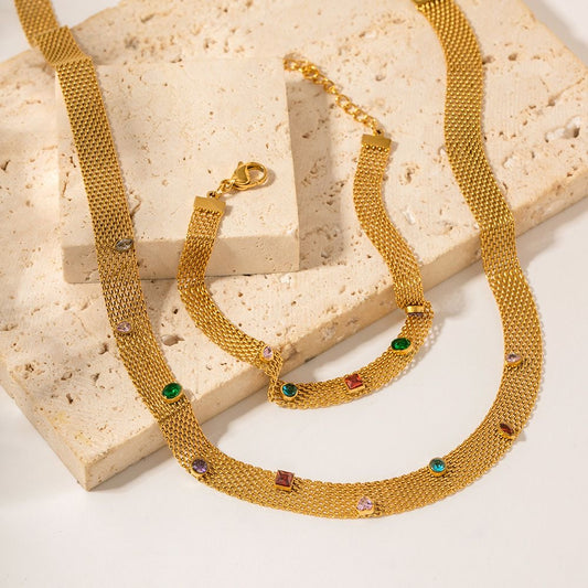 Choker and bracelet with colored gems.