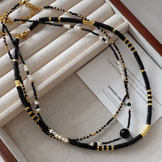 Exquisite beaded necklace in black and gold
